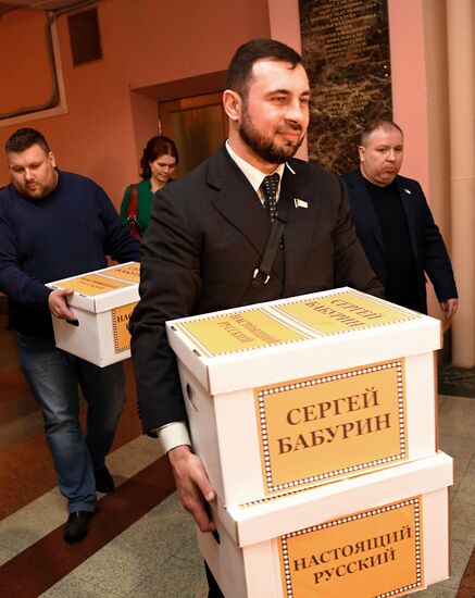 Submitting signatures in support of Sergei Baburin's registration as presidential candidate