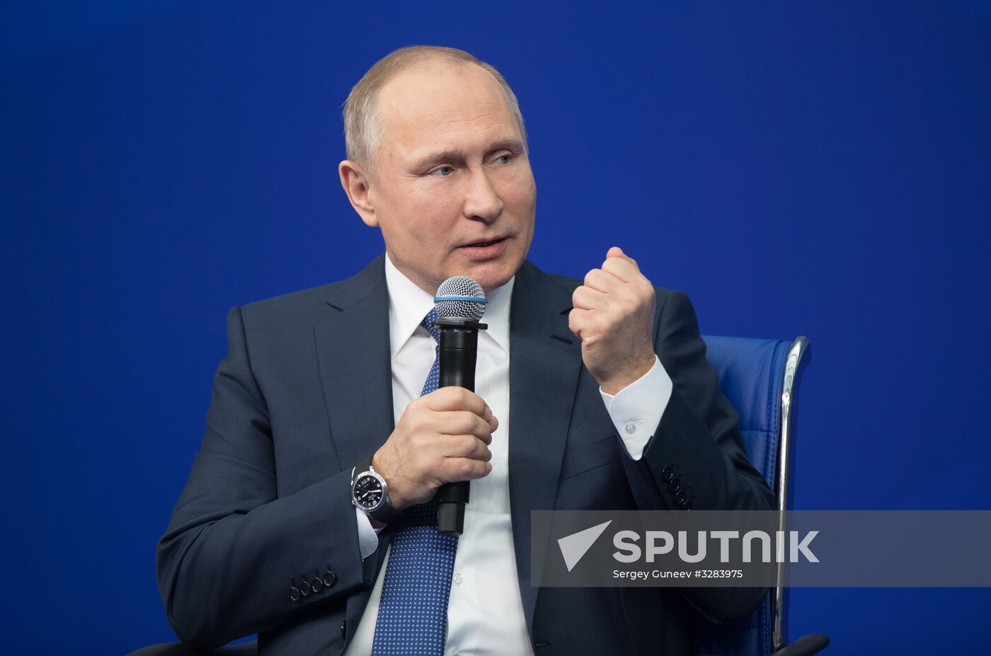 Russian presidential candidate Vladimir Putin meets with his authorized representatives