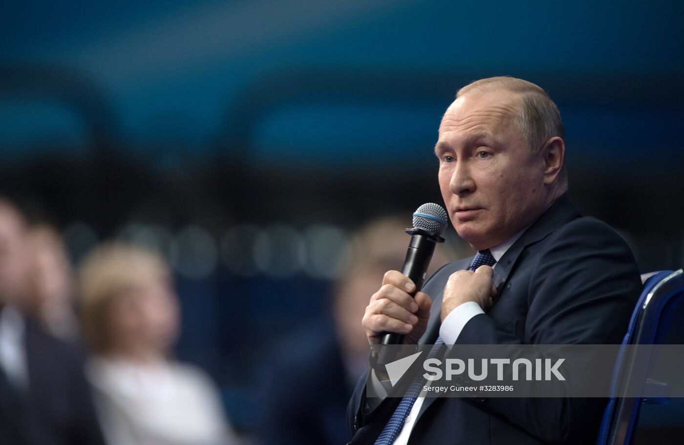 Russian presidential candidate Vladimir Putin meets with his authorized representatives