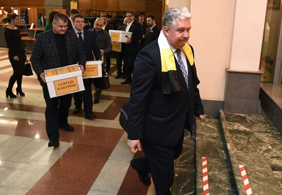 Submitting signatures in support of Sergei Baburin's registration as presidential candidate