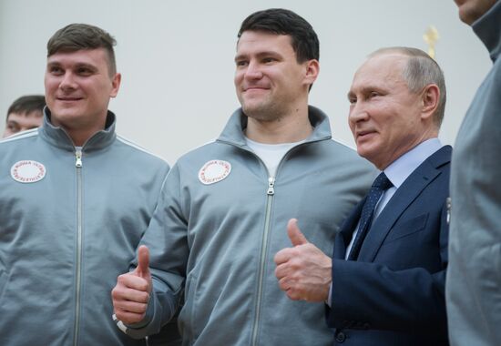 President Vladimir Putin meets with Russian athletes competing in 23rd Winter Olympic Games in PyeongChang