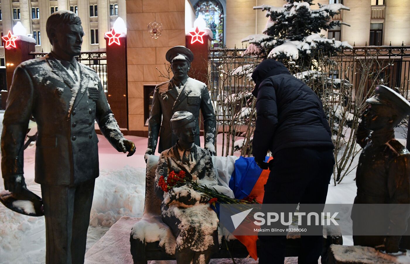 Flowers in memory of killed pilot Roman Filippov at Russian Defense Ministry