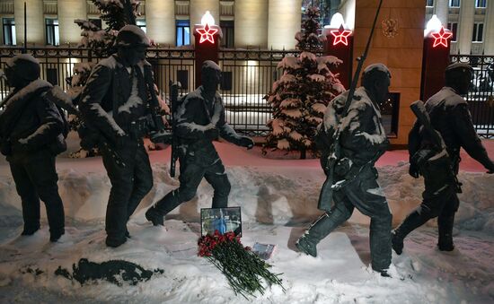 Flowers in memory of killed pilot Roman Filipov at Russian Defense Ministr