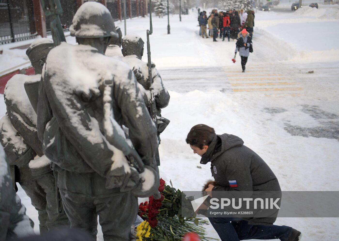 Flowers in memory of killed pilot Roman Filipov at Russian Defense Ministry