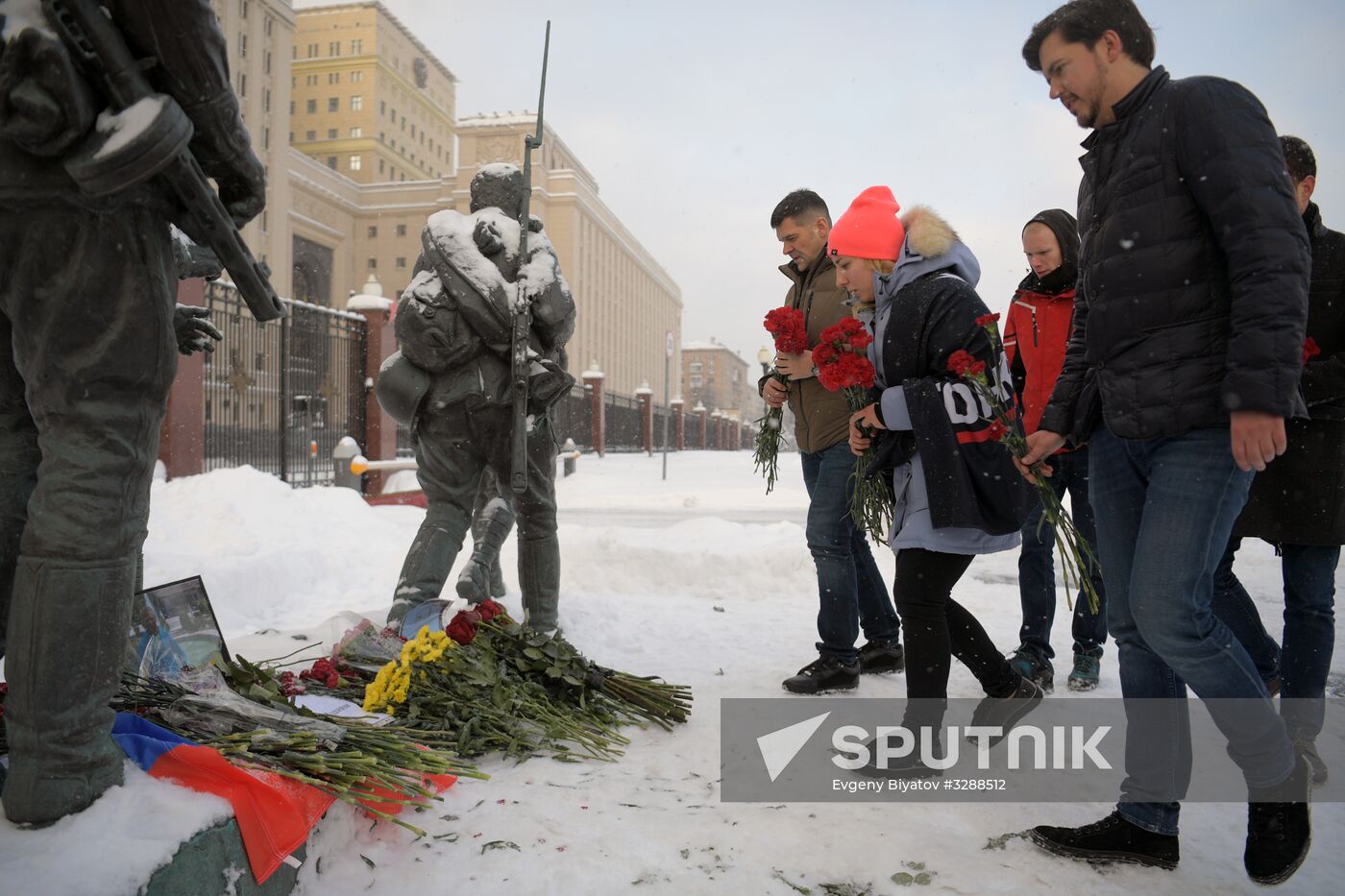 Flowers in memory of killed pilot Roman Filipov at Russian Defense Ministry