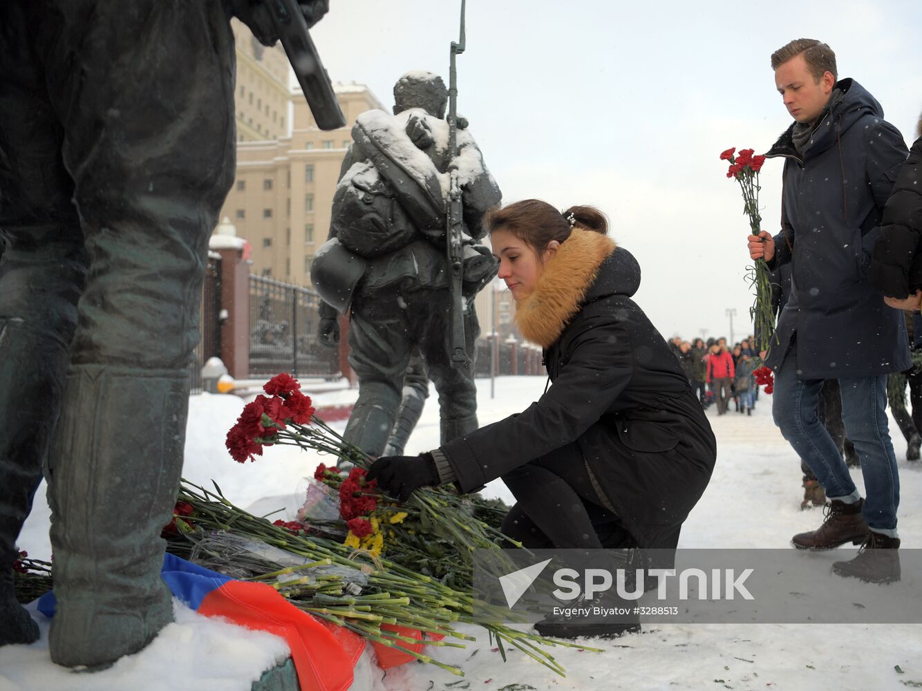 Flowers in memory of killed pilot Roman Filipov at Russian Defense Ministry