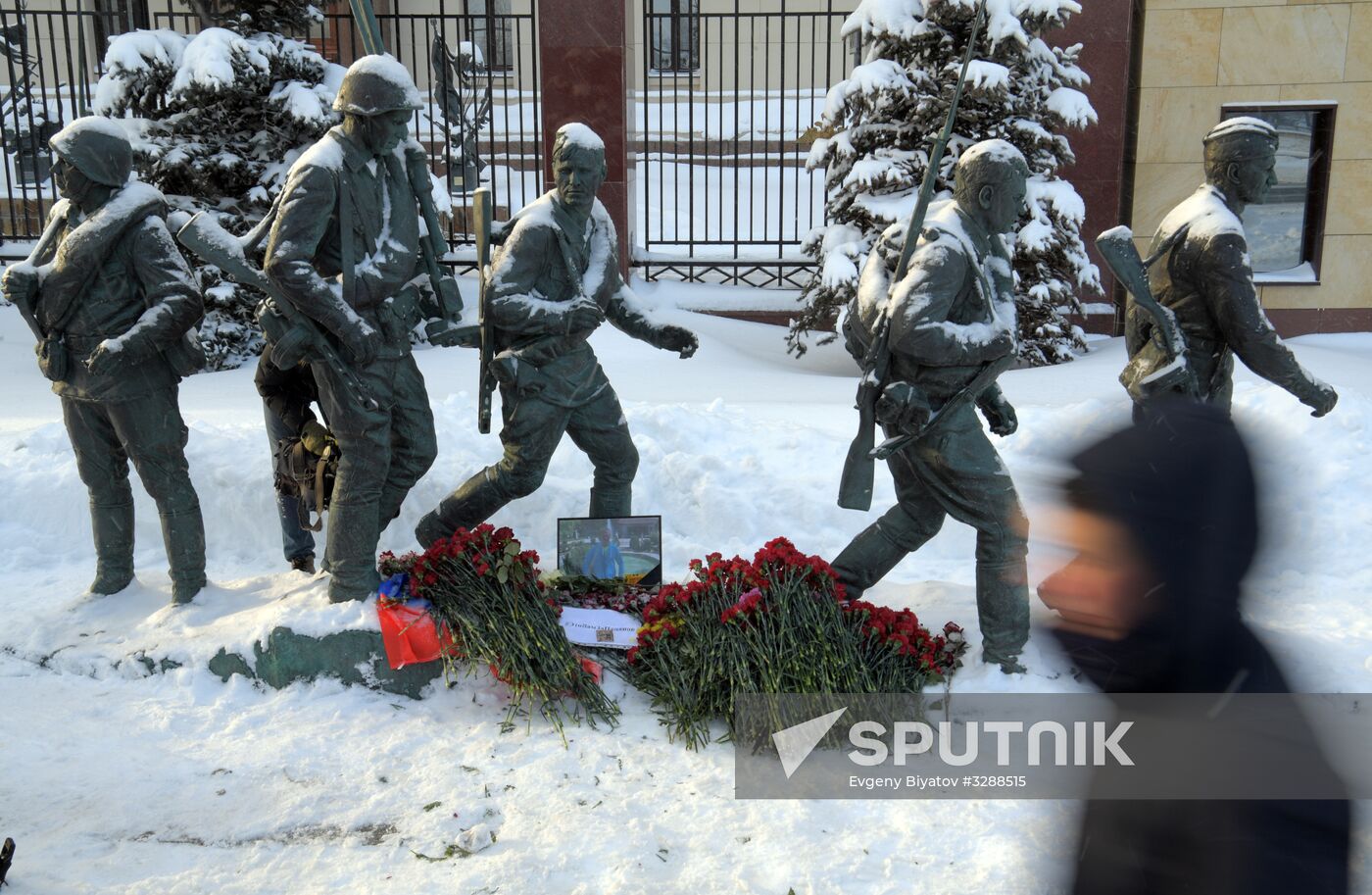 Flowers in memory of killed pilot Roman Filipov at Russian Defense Ministry