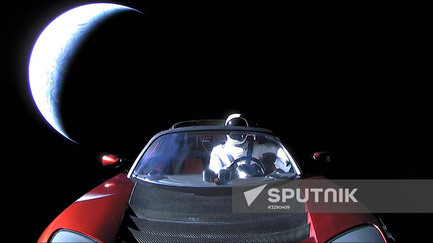 SpaceX CEO Elon Musk's own car, red Tesla Roadster cabrio, entered into orbit by the Falcon Heavy launcher, with a dummy wearing a spacesuit at the steering wheel, in outer space. The image is a handout courtesy of a third party. Editorial use only. Archiving, commercial use and use in advertising are prohibited. SpaceX's Falcon Heavy rocket successfully launches from Cape Canaveral