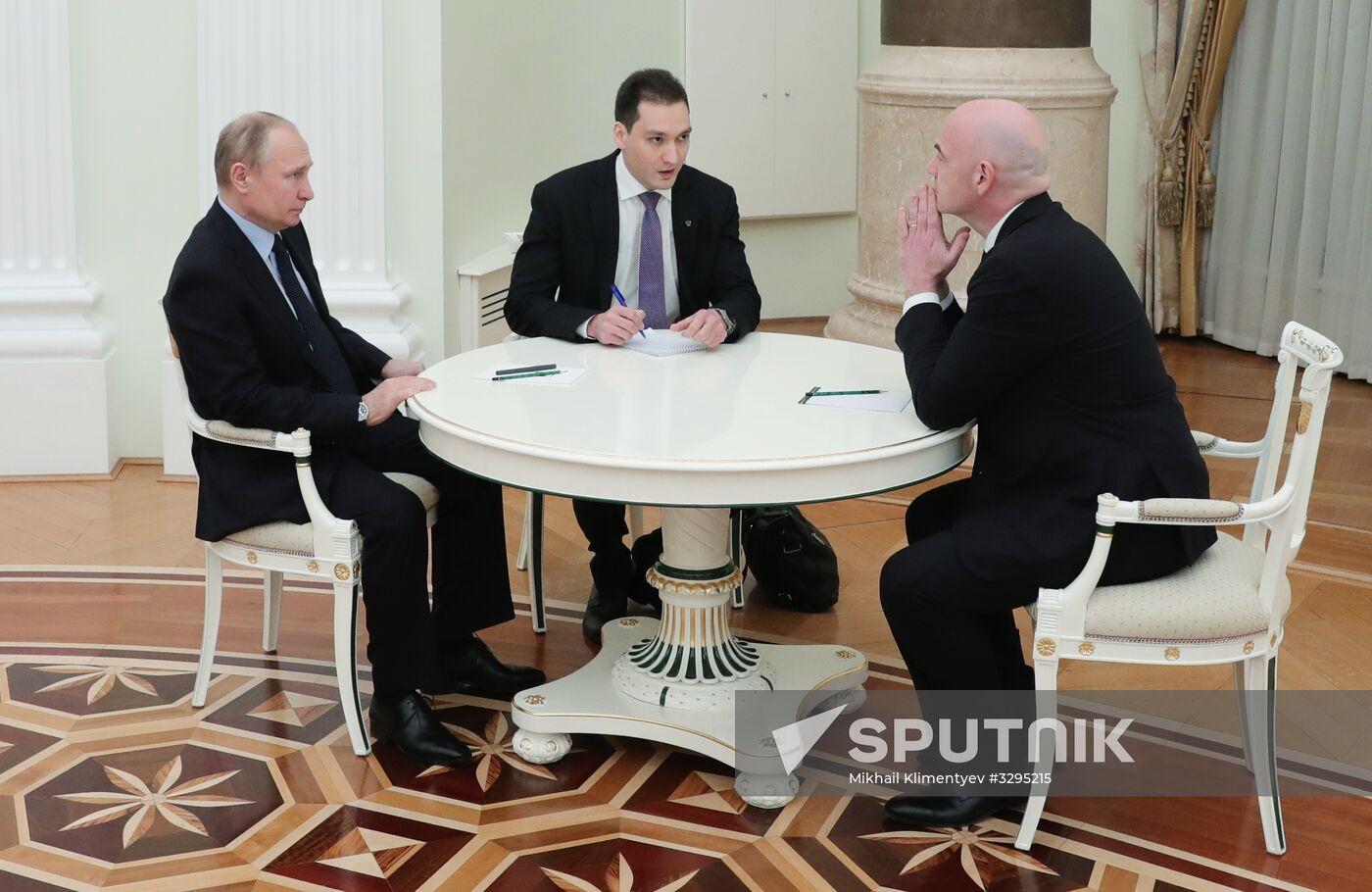 President Vladimir Putin meets with FIFA President Gianni Infantino