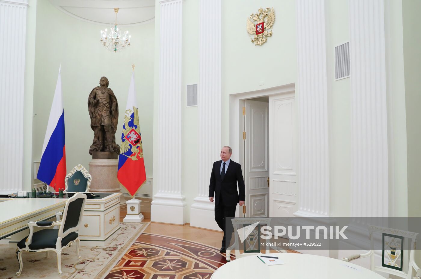 President Vladimir Putin meets with FIFA President Gianni Infantino