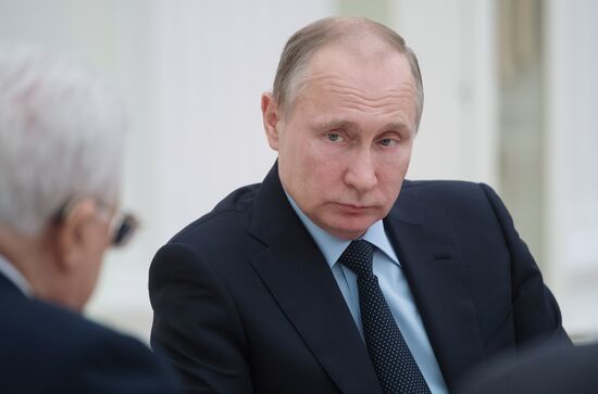 President Vladimir Putin meets with Palestinian President Mahmoud Abbas