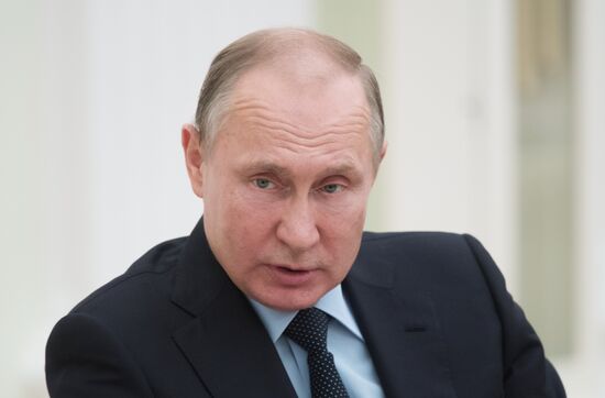 President Vladimir Putin meets with Palestinian President Mahmoud Abbas