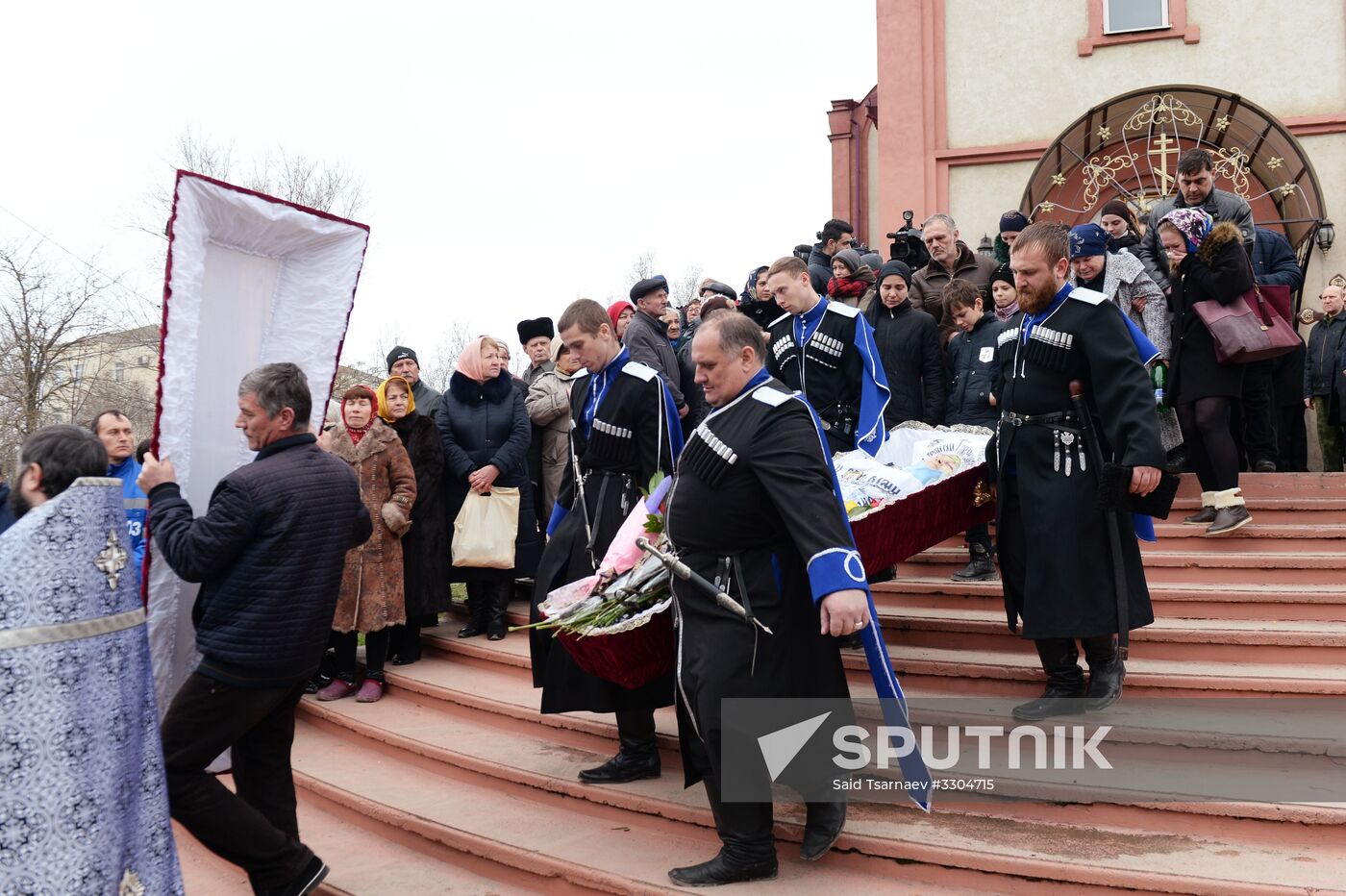 Funeral for those killed in shooting near St. George's Church in Kizlyar