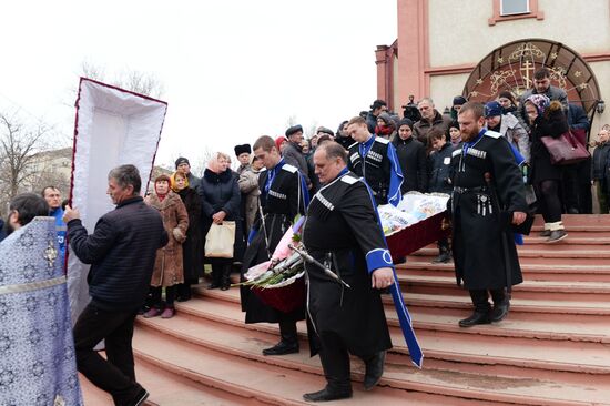 Funeral for those killed in shooting near St. George's Church in Kizlyar