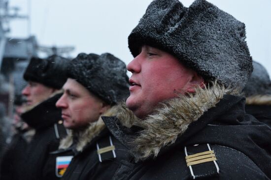 Hoisting Guards Navy Flag aboard guided missile cruiser Varyag