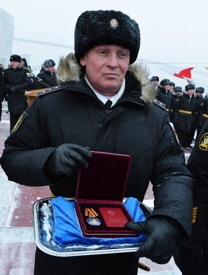 Hoisting Guards Navy Flag aboard guided missile cruiser Varyag