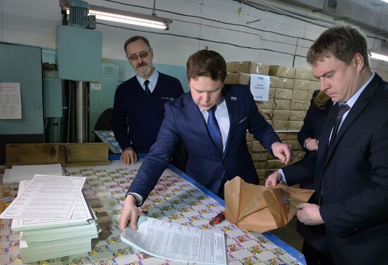 Handing over voting ballots for presidential election in Chelyabinsk Region