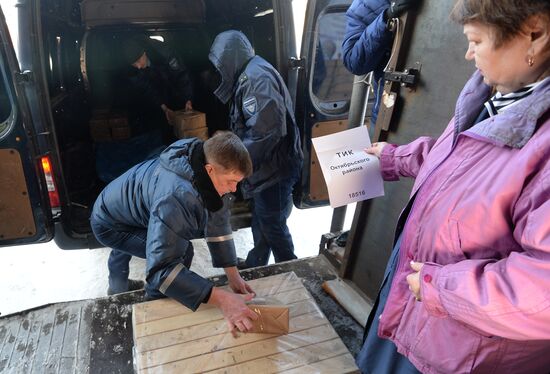 Handing over voting ballots for presidential election in Chelyabinsk Region