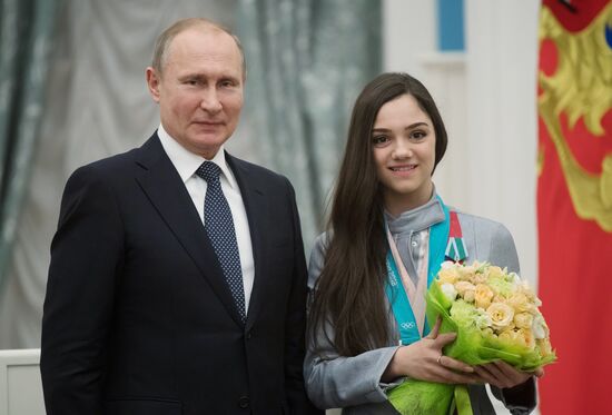 President Vladimir Putin presents state decorations to 2018 Winter Olympics medalists