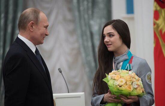 President Vladimir Putin presents state decorations to 2018 Winter Olympics medalists