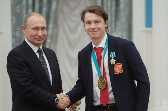 President Vladimir Putin presents state decorations to 2018 Winter Olympics medalists