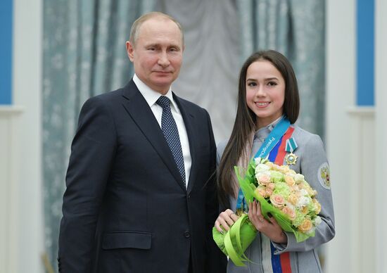 President Vladimir Putin presents state decorations to 2018 Winter Olympics medalists
