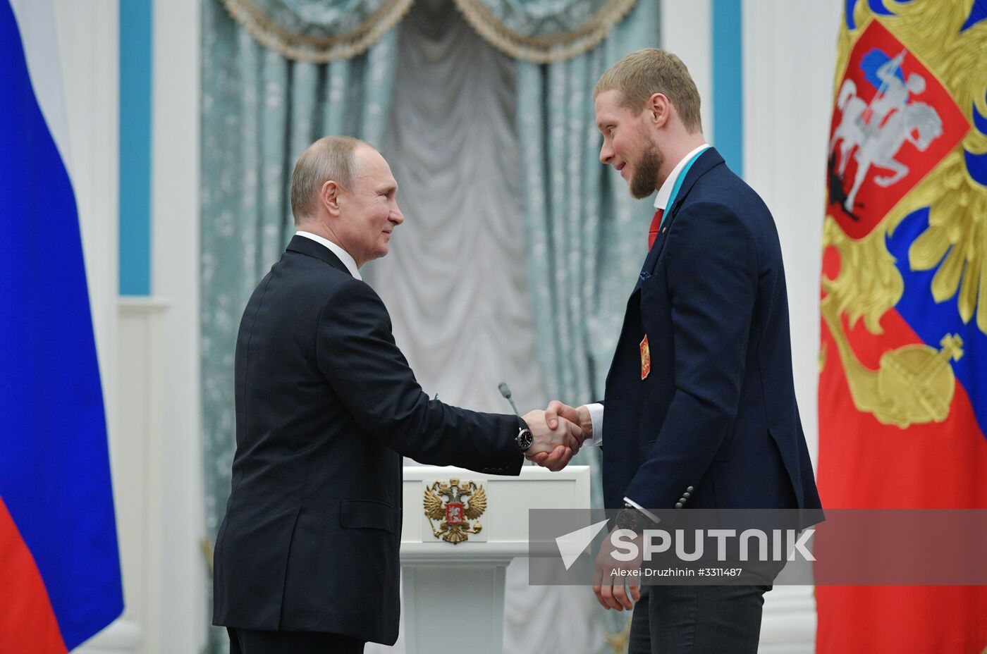 President Vladimir Putin presents state decorations to 2018 Winter Olympics medalists