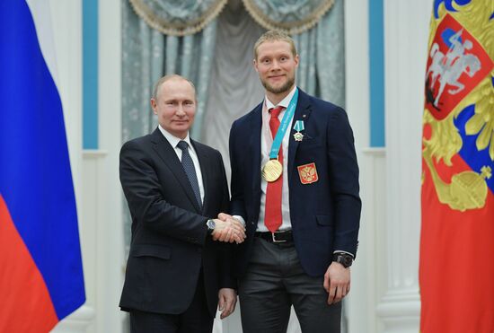 President Vladimir Putin presents state decorations to 2018 Winter Olympics medalists