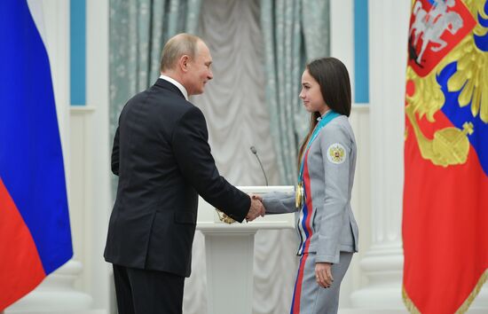President Vladimir Putin presents state decorations to 2018 Winter Olympics medalists