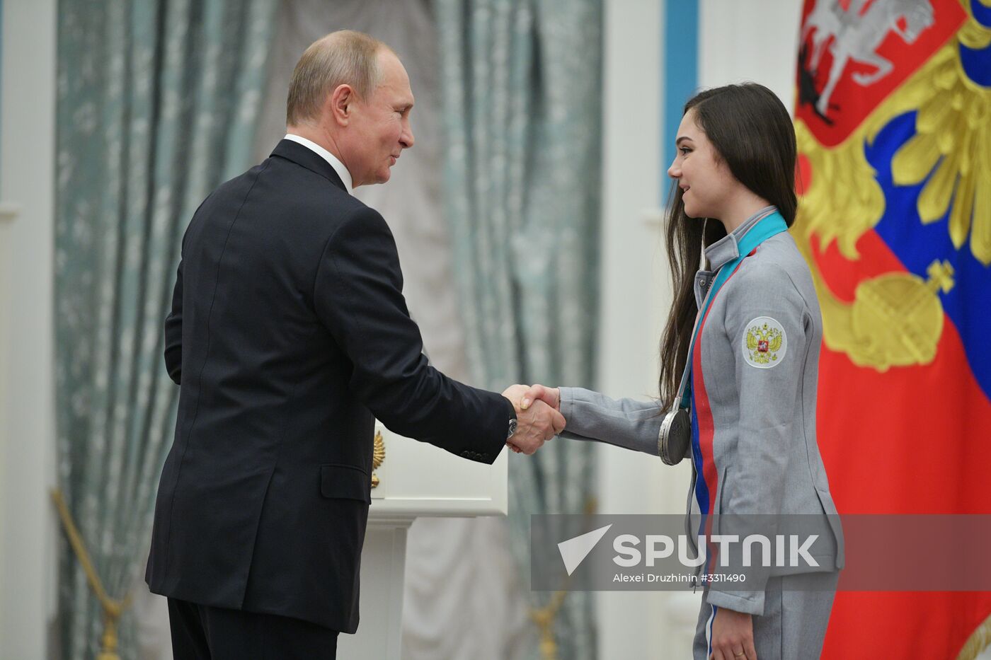 President Vladimir Putin presents state decorations to 2018 Winter Olympics medalists