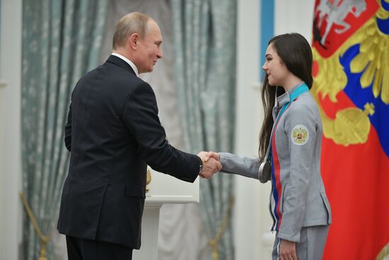 President Vladimir Putin presents state decorations to 2018 Winter Olympics medalists