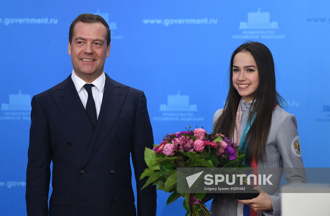 Prime Minister Dmitry Medvedev presents cars to 2018 Winter Olympics medalists at ceremony