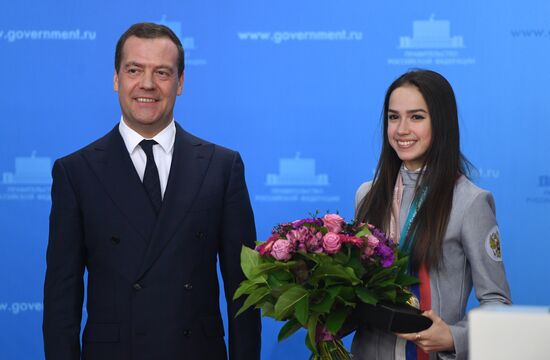 Prime Minister Dmitry Medvedev presents cars to 2018 Winter Olympics medalists at ceremony