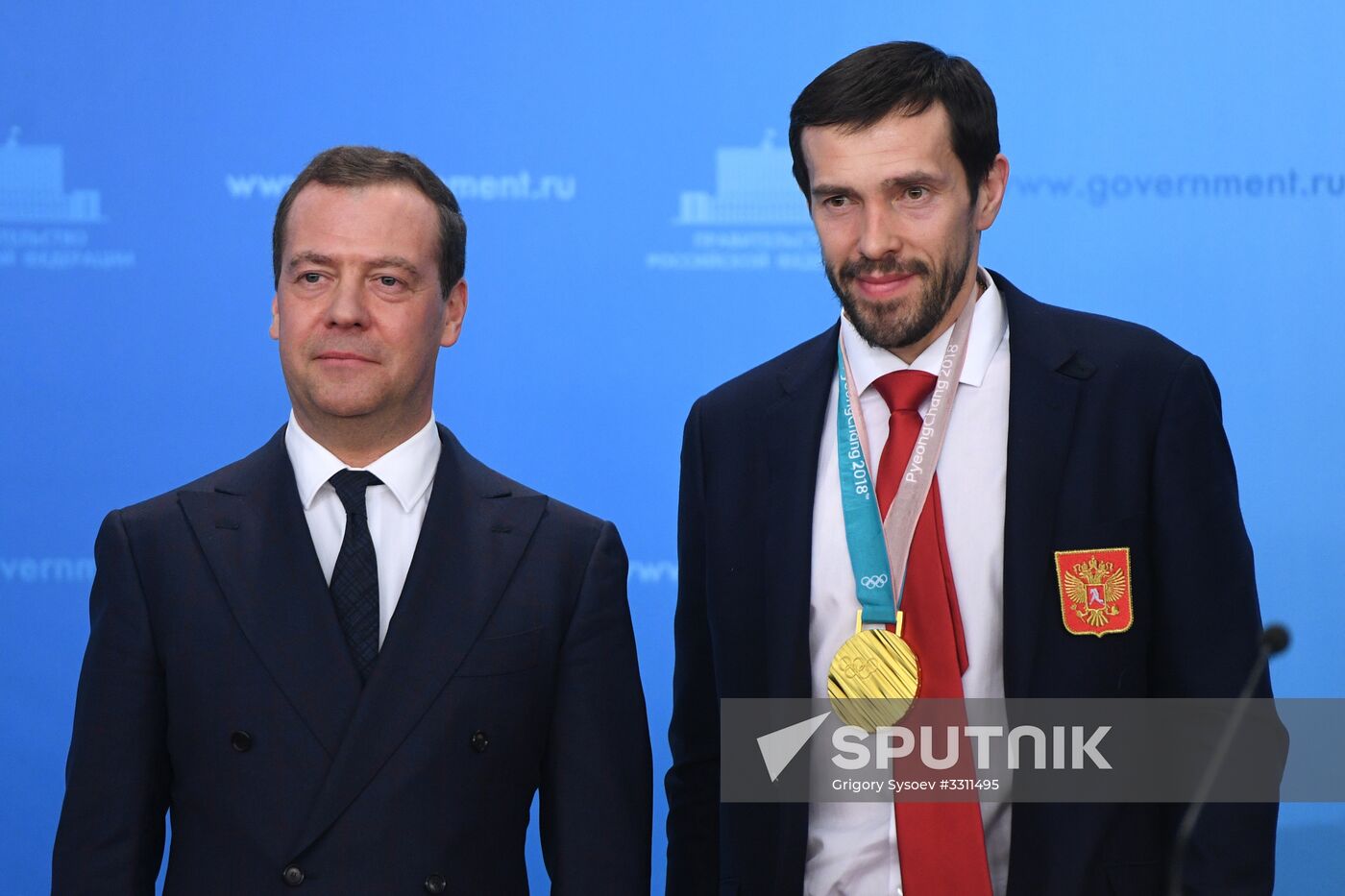 Prime Minister Dmitry Medvedev presents cars to 2018 Winter Olympics medalists at ceremony