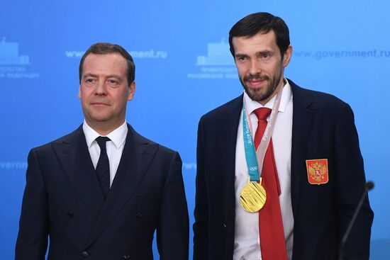 Prime Minister Dmitry Medvedev presents cars to 2018 Winter Olympics medalists at ceremony