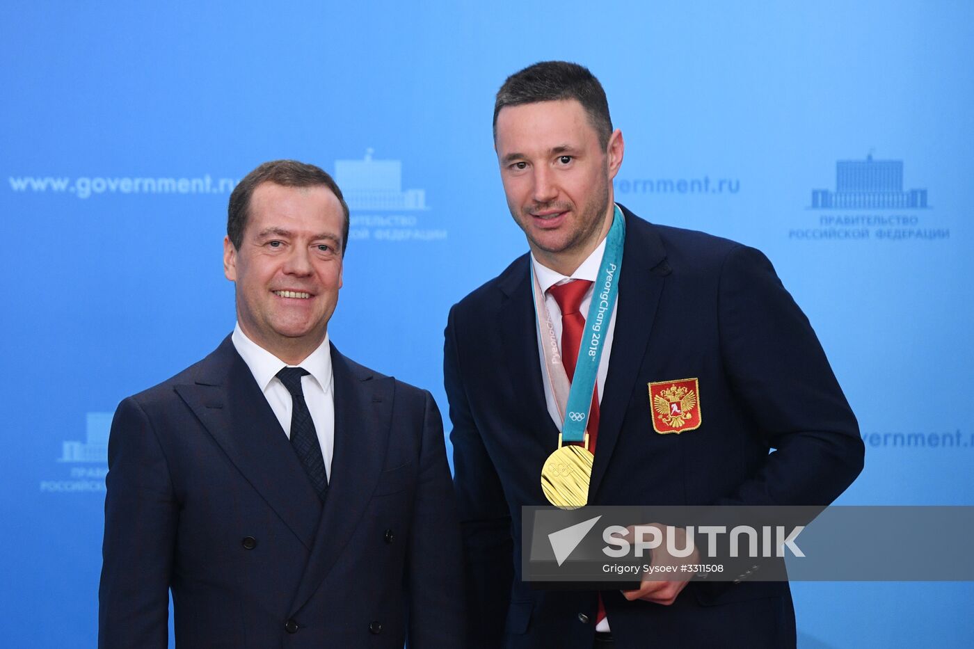 Prime Minister Dmitry Medvedev presents cars to 2018 Winter Olympics medalists at ceremony