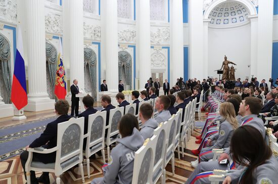 President Vladimir Putin presents state decorations to 2018 Winter Olympics medalists