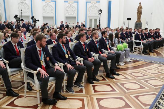 President Vladimir Putin presents state decorations to 2018 Winter Olympics medalists