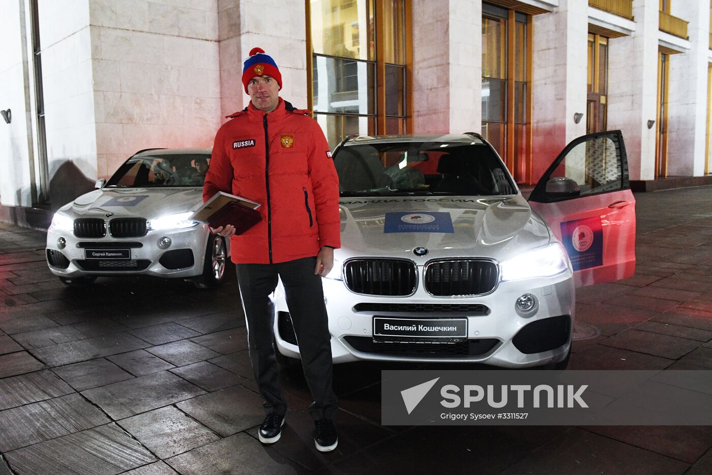Prime Minister Dmitry Medvedev presents cars to 2018 Winter Olympics medalists at ceremony
