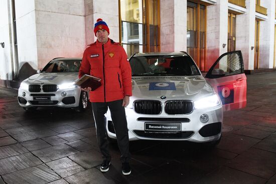 Prime Minister Dmitry Medvedev presents cars to 2018 Winter Olympics medalists at ceremony