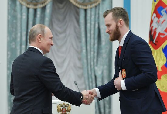 President Vladimir Putin presents state decorations to 2018 Winter Olympics medalists