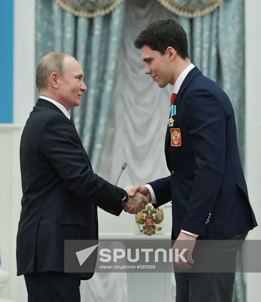 President Vladimir Putin presents state decorations to 2018 Winter Olympics medalists