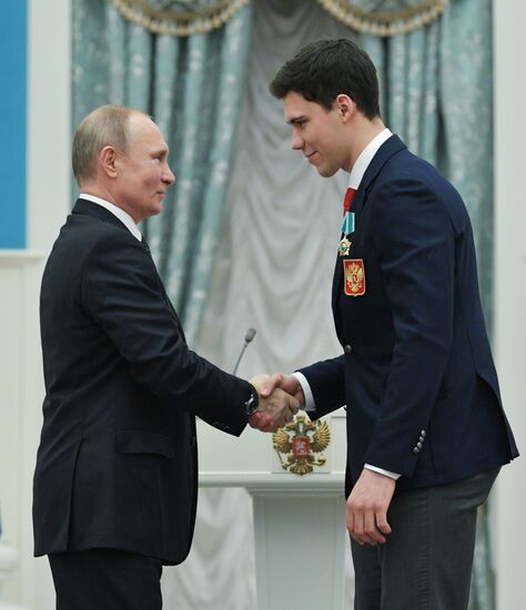 President Vladimir Putin presents state decorations to 2018 Winter Olympics medalists
