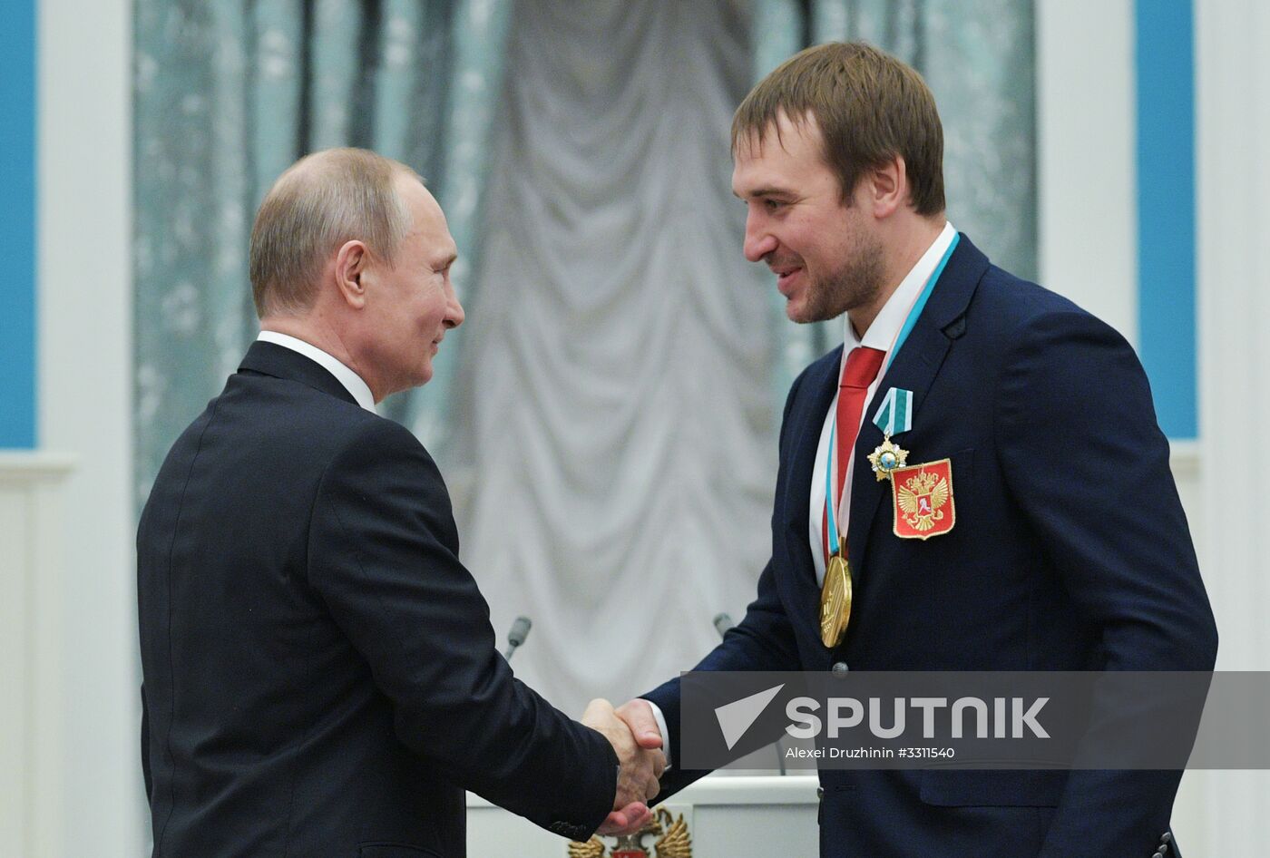 President Vladimir Putin presents state decorations to 2018 Winter Olympics medalists