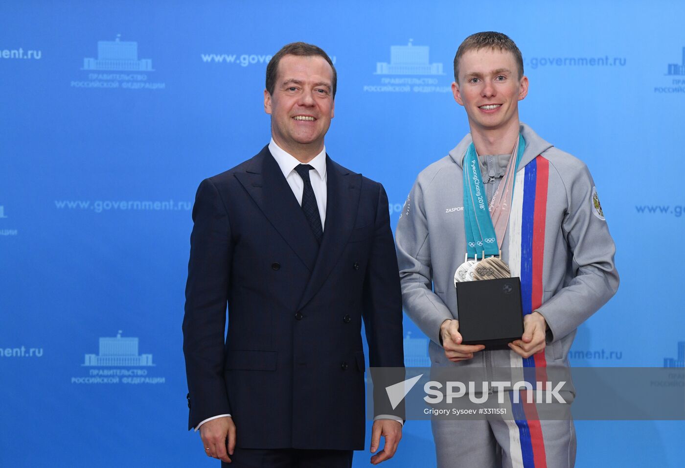 Prime Minister Dmitry Medvedev presents cars to 2018 Winter Olympics medalists at ceremony
