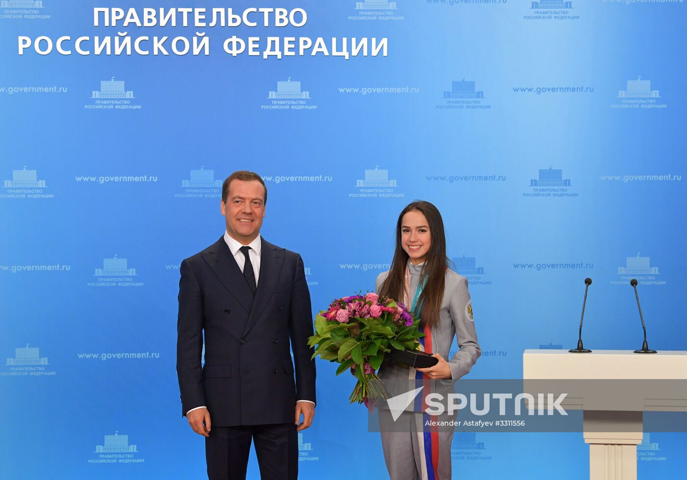 Prime Minister Dmitry Medvedev presents cars to 2018 Winter Olympics medalists at ceremony