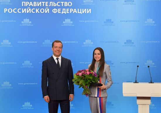 Prime Minister Dmitry Medvedev presents cars to 2018 Winter Olympics medalists at ceremony