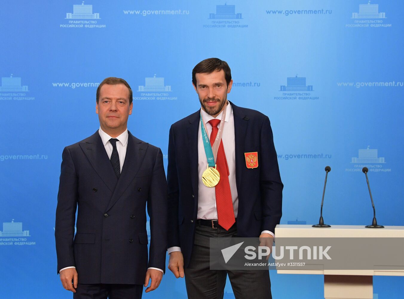 Prime Minister Dmitry Medvedev presents cars to 2018 Winter Olympics medalists at ceremony