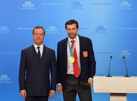 Prime Minister Dmitry Medvedev presents cars to 2018 Winter Olympics medalists at ceremony