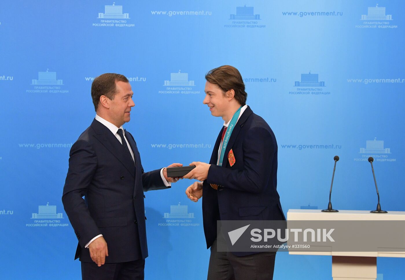 Prime Minister Dmitry Medvedev presents cars to 2018 Winter Olympics medalists at ceremony